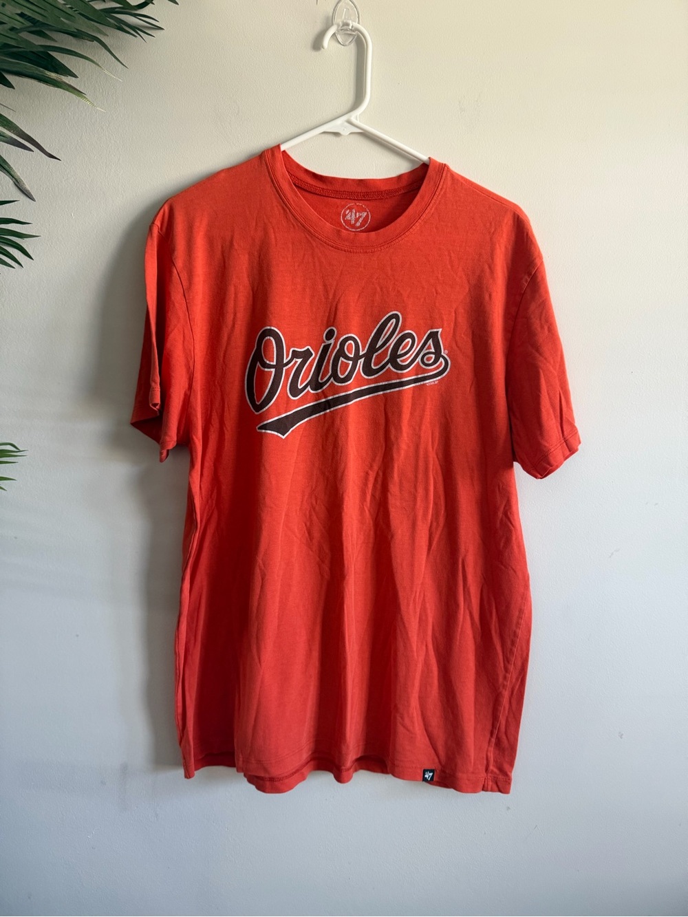 47 Brand Orioles Script Tee in Orange with Black & White Logo
